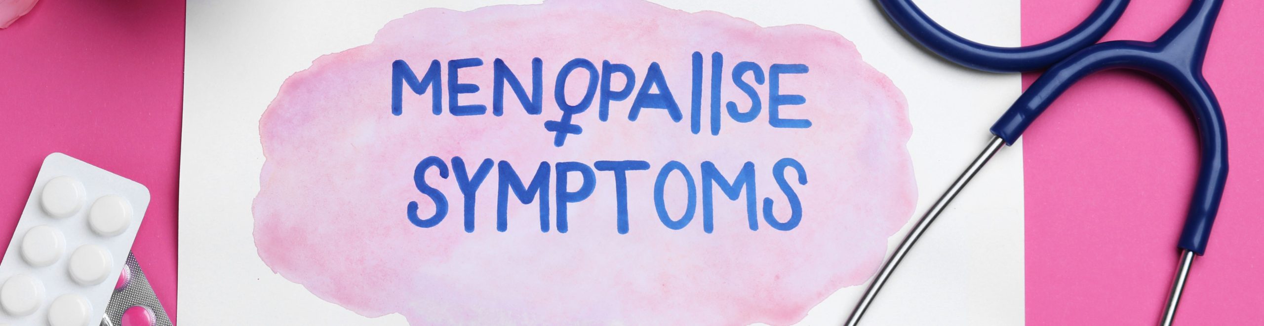 Menopause Symptoms written on a cardboard